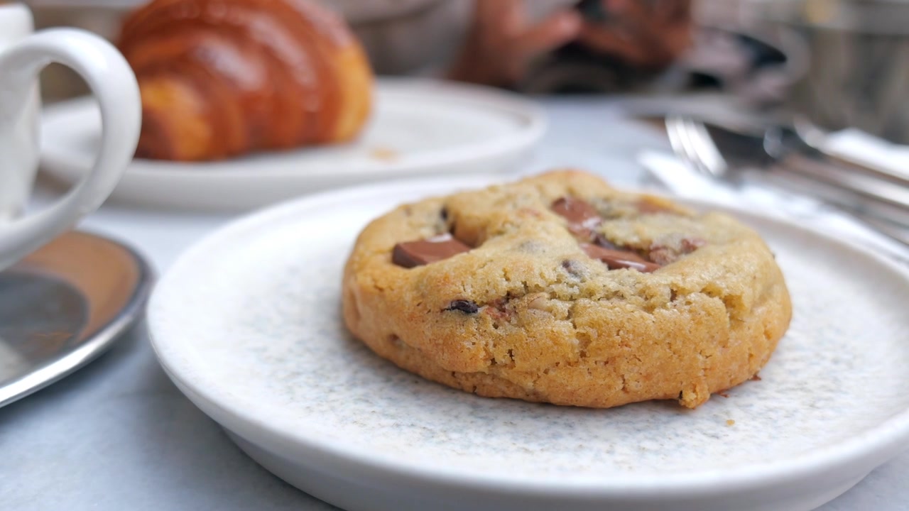 Delicious Chocolate Chip Cookie on a White Plate