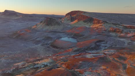 Flying-towards-Bioda-Buidhe,-Loch-Leum-nu-Luirginn-and-Loch-Cleat-at-dawn-in-winter