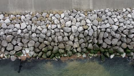 Birds-eye-view-of-sea-defences-in-Reculver,-Kent,-UK