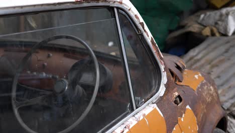 pull back shot of old car, fiat 500, bangkok, thailand