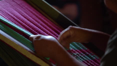 Indigenous-woman-weaving-a-blanket