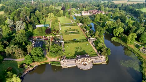 capture the majestic beauty of hever castle's lake and grounds from above with stunning aerial drone footage. perfect for historical, travel, and cinematic content.