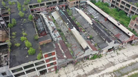 aerial view of rotting buildings in detroit