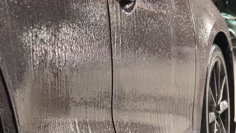 car being washed with foam