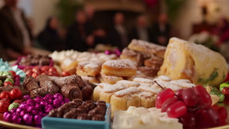 a luxurious spread of desserts and chocolates at a gathering