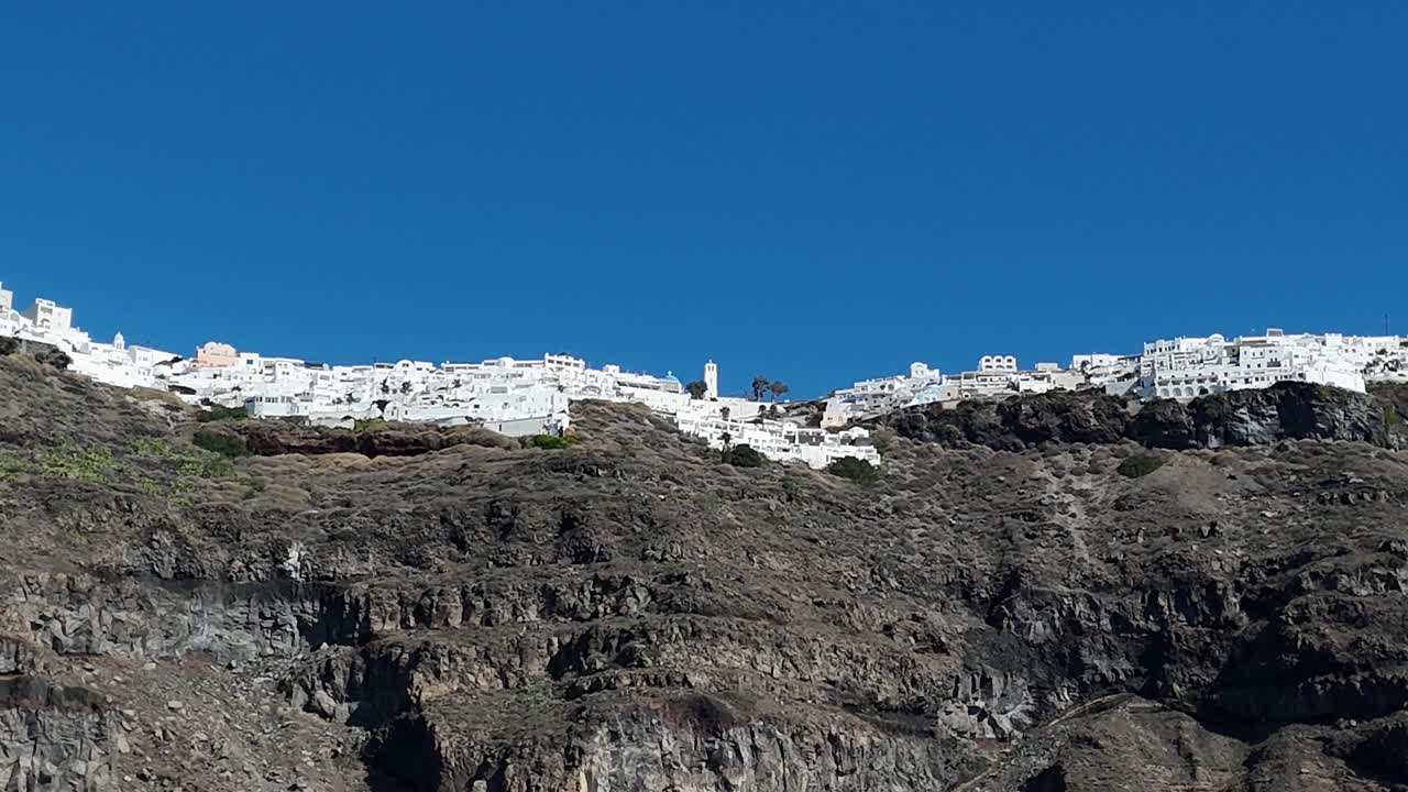 cliffside dwellings in Fira, Santorini Island, Greece in the Mediterranean sea