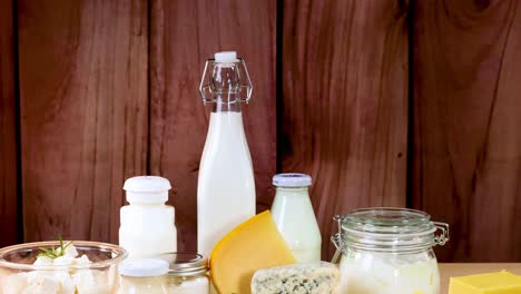 assorted dairy items displayed on wooden surface