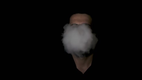 man disappearing behind smoke, black background