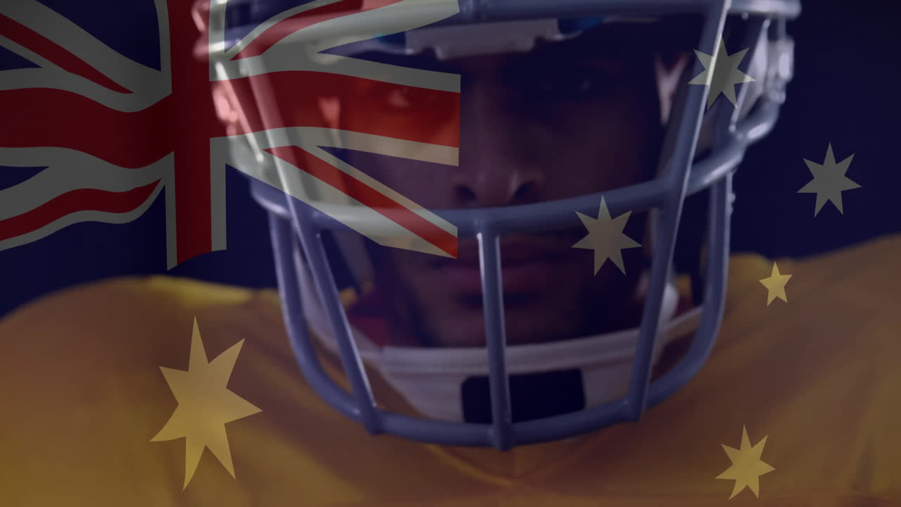 Joueur de football américain en action sur le terrain, portant un casque avec le drapeau australien