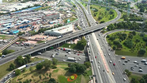 aerial view of highway junction with traffic routine