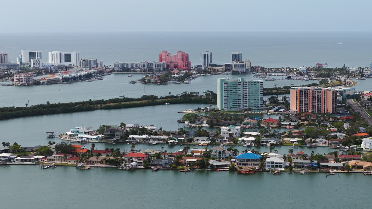 Aerial pan of the Island Estates, Memorial Causeway and Clearwater beach and Point