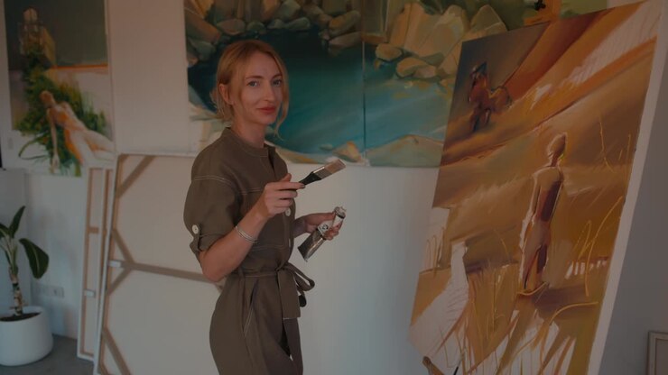 Woman Artist Painting in Studio