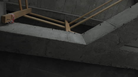 construction site interior - concrete and wood beams