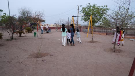 kids and adults enjoying outdoor park with swing and activities at evening video is taken at pachetia hill outdoor park jodhpur rajasthan india on aug 19 2024.