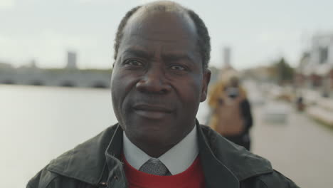 portrait of african american businessman outdoors