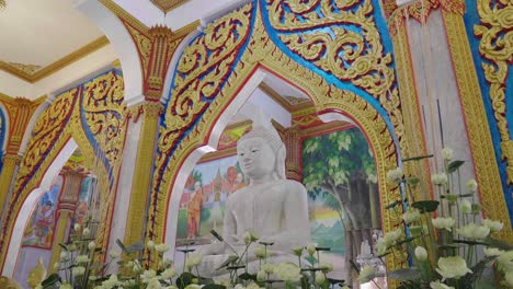 white statue buhhda in church of wat chalong phuket,thailand