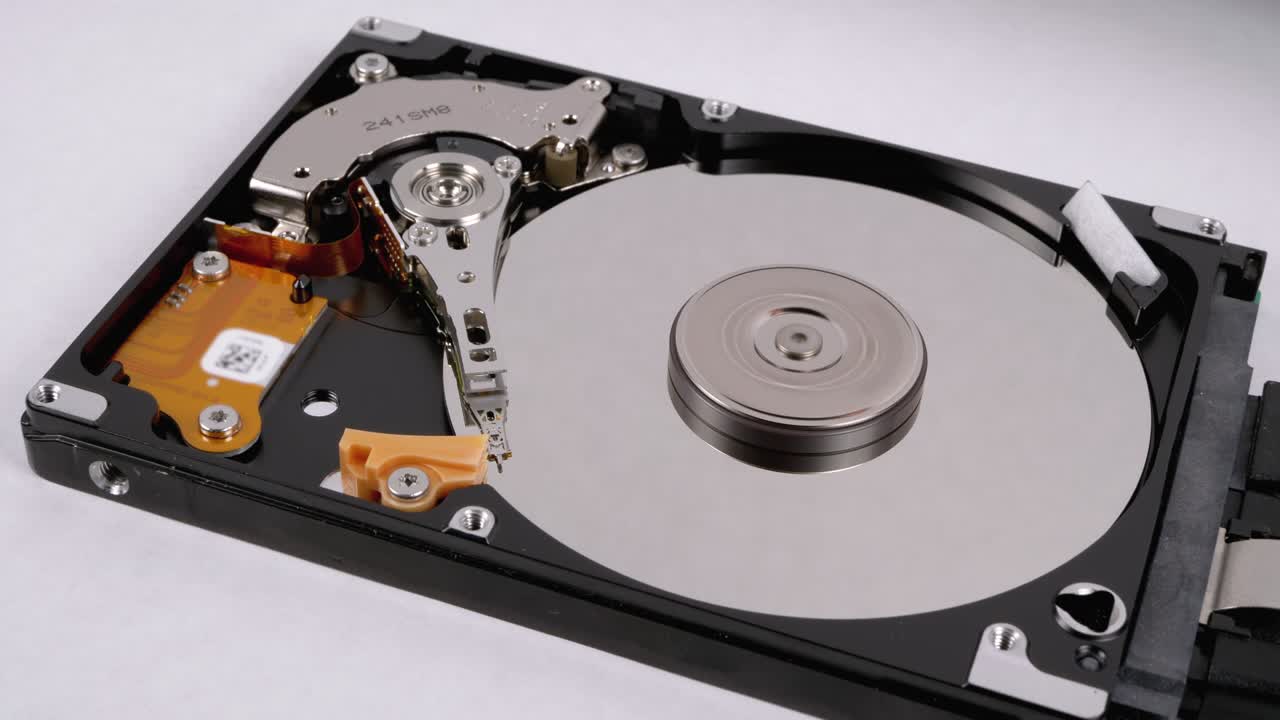 Hard Disk Drive Inside. Structure of HDD, Spinning Platter. Move magnetic head