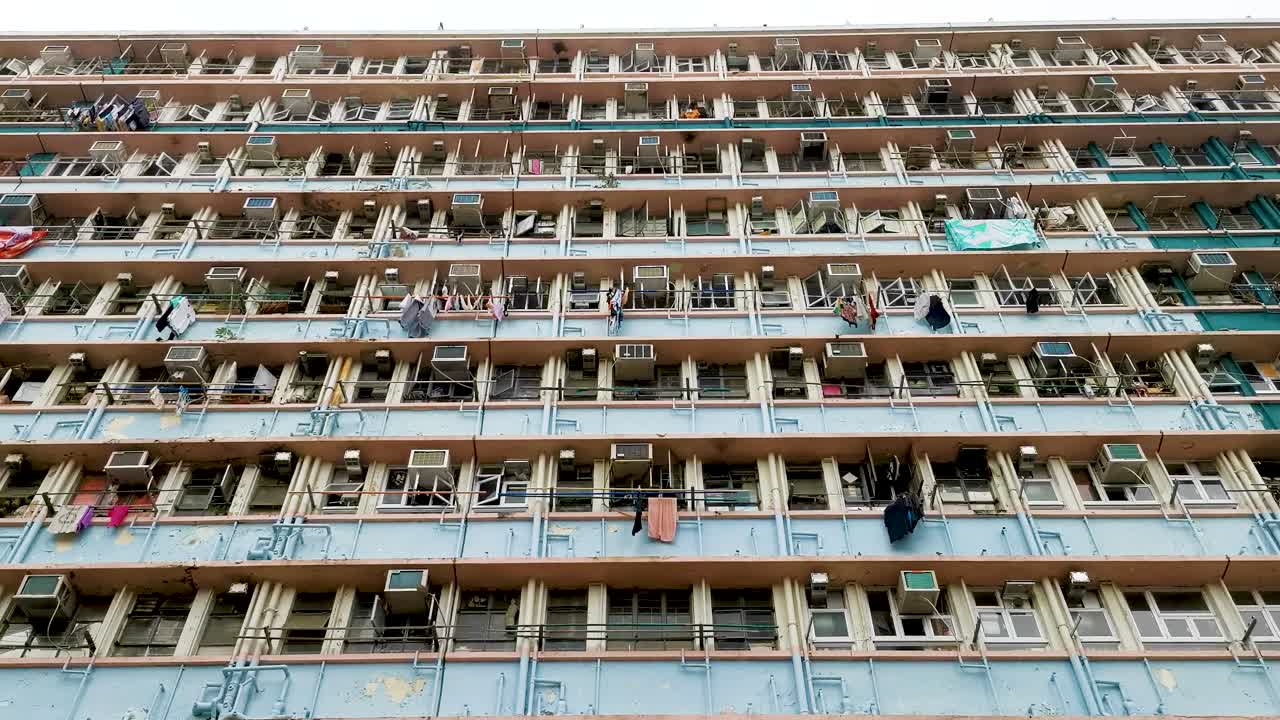 Low angle of colorful and beautiful public house, small flat rent dorm room in old town, Wong Chuk Hang, Hong Kong.