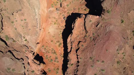 Top-down-drone-shot-flying-over-interesting-rock-formations-in-the-Reserva-Banda-Florida-in-La-Rioja,-Argentina