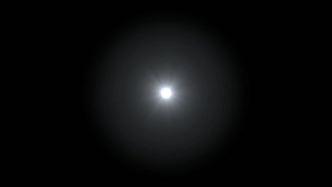 realistic light lens flare on black background.