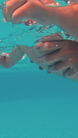 happy family having fun in the swimming pool.