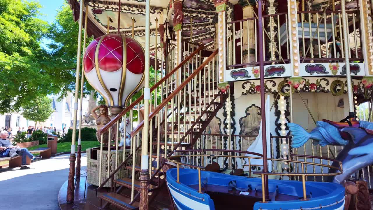 Close-up view about the left side details when a Carousel moving, La Rochelle, France.