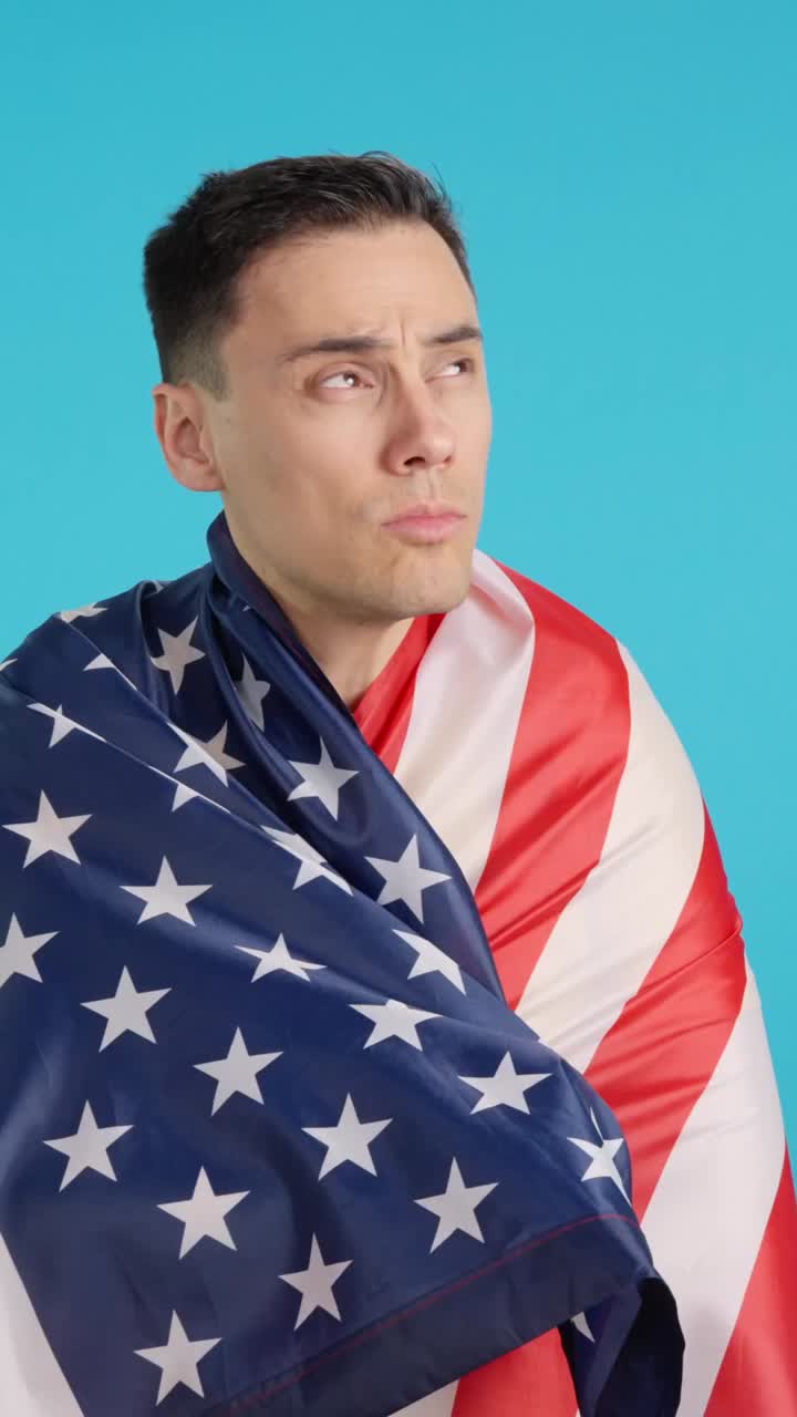 Man draped in American flag