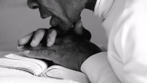 praying-to-god-with-bible-on-white-background-with-people-stock-video-stock-footage