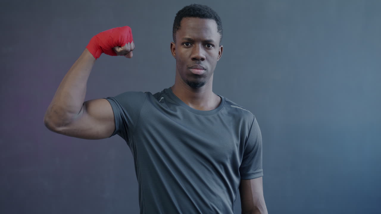 Man Showing Off Boxing Muscle