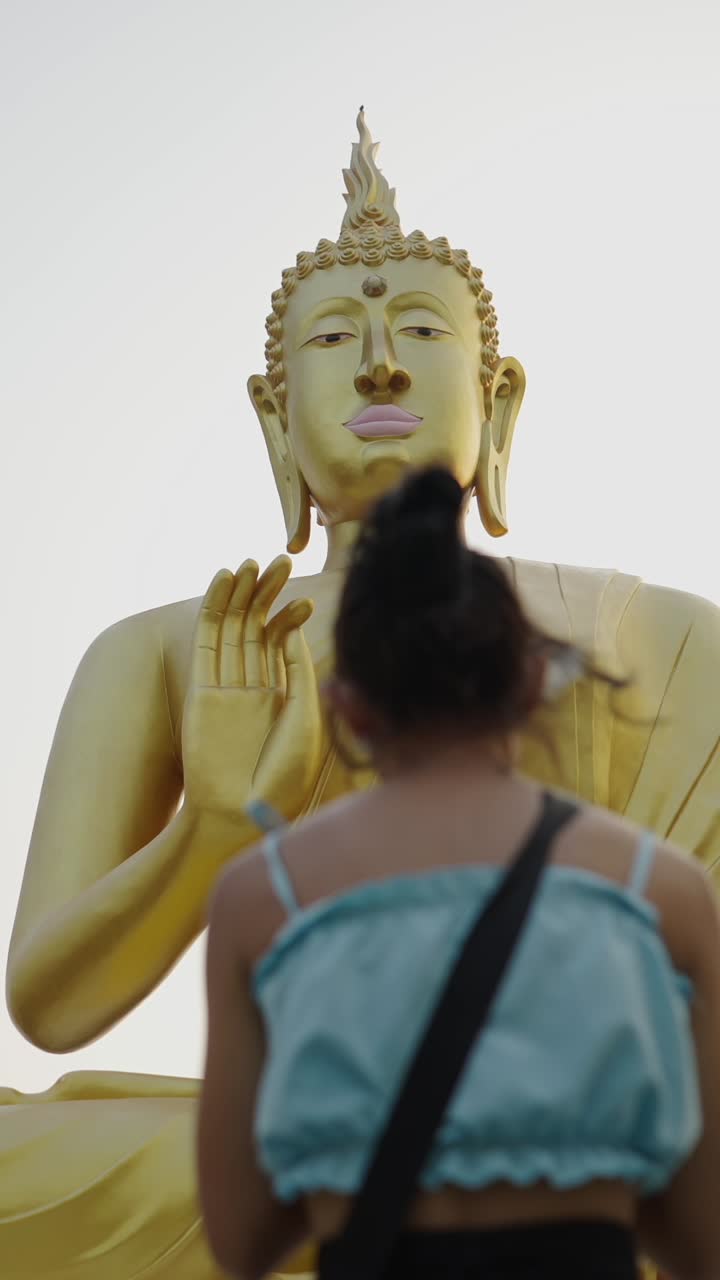 Buddha statue with woman