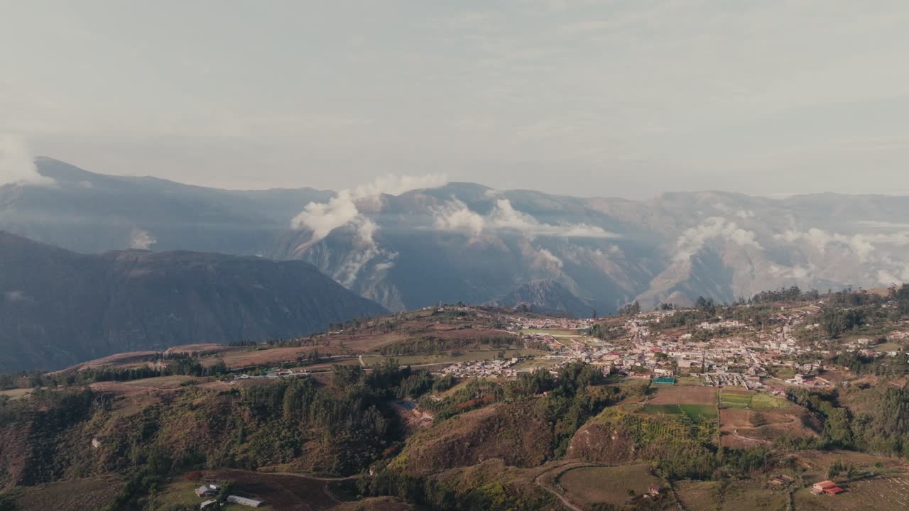 Remote Landscape Of Town Over Highlands Of Peru In South America. Aerial Drone Shot