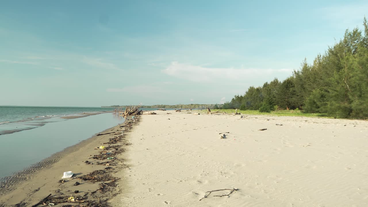 Underated Sunset Gerigat Beach,Fishing Village Kabong.White Sandy Beach,Green Coconut Trees and Blue Sea,Sky Sarawak,Borneo.
