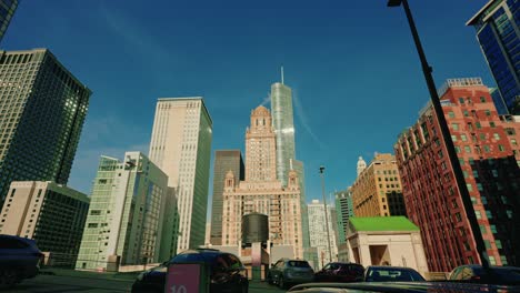 tilting down wide chicago downtown in the winter with smoke coming from horns