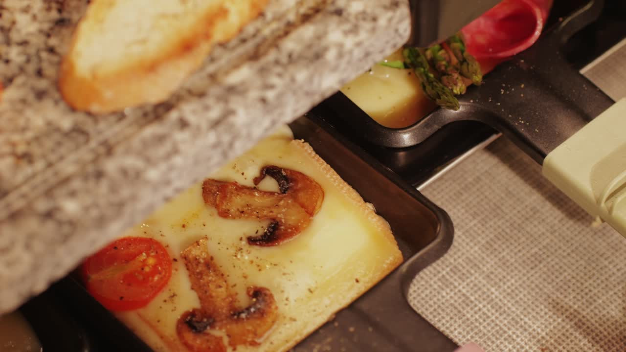 French Swiss or Spanish restaurant with traditional tapas food, Spanish cuisine, delicious tapas and cheese plate, bruschetta with cheese, olives dry tomatoes and tasty sandwich bar appetizer, buffet