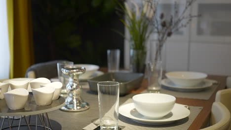 fancy dinner set up for soup service before the start of a formal event