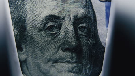 close-up of a one hundred dollar bill