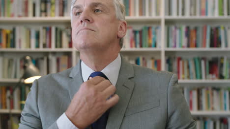 portrait-of-mature-caucasian-businessman-boss-using-smartphone-checking-messages-networking-looking-at-wrist-watch-preparing-for-meeting-looking-confident-at-camera