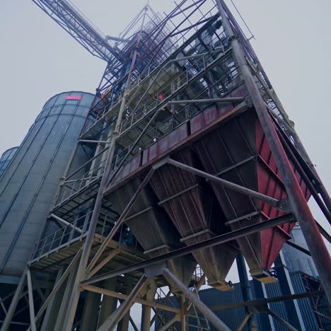 commercial grain silos on sky background