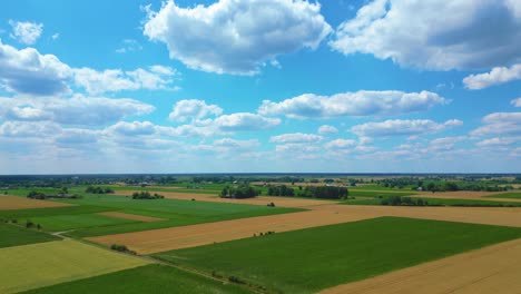 aerial view of powerful wind turbine farm for energy production on beautiful cloudy sky at highland