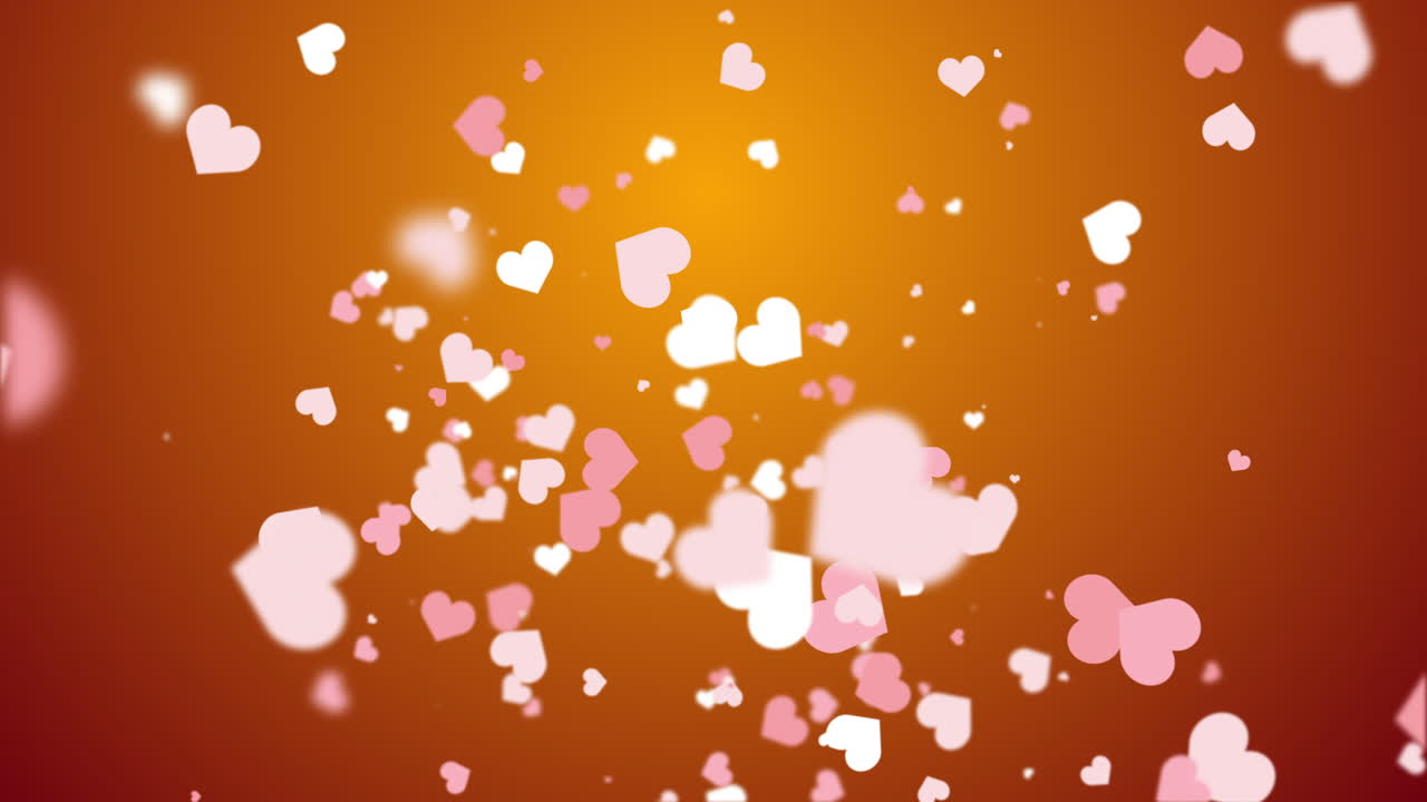 Freely falling down colored figures of hearts. Animated abstract yellow background. Looped video. Concept for valentine's day, wedding.