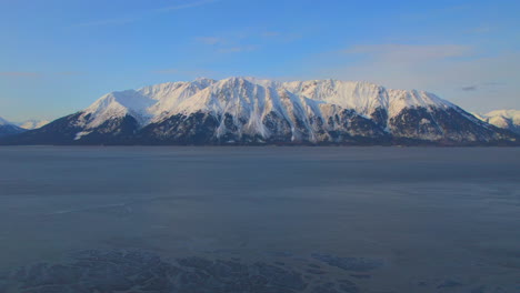 sunrise slow reveal of beautiful mountains from the scenic seward highway in alaska