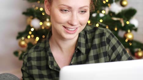 woman using laptop and credit card during online shopping