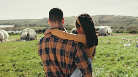 back, carrying child and a father on a farm