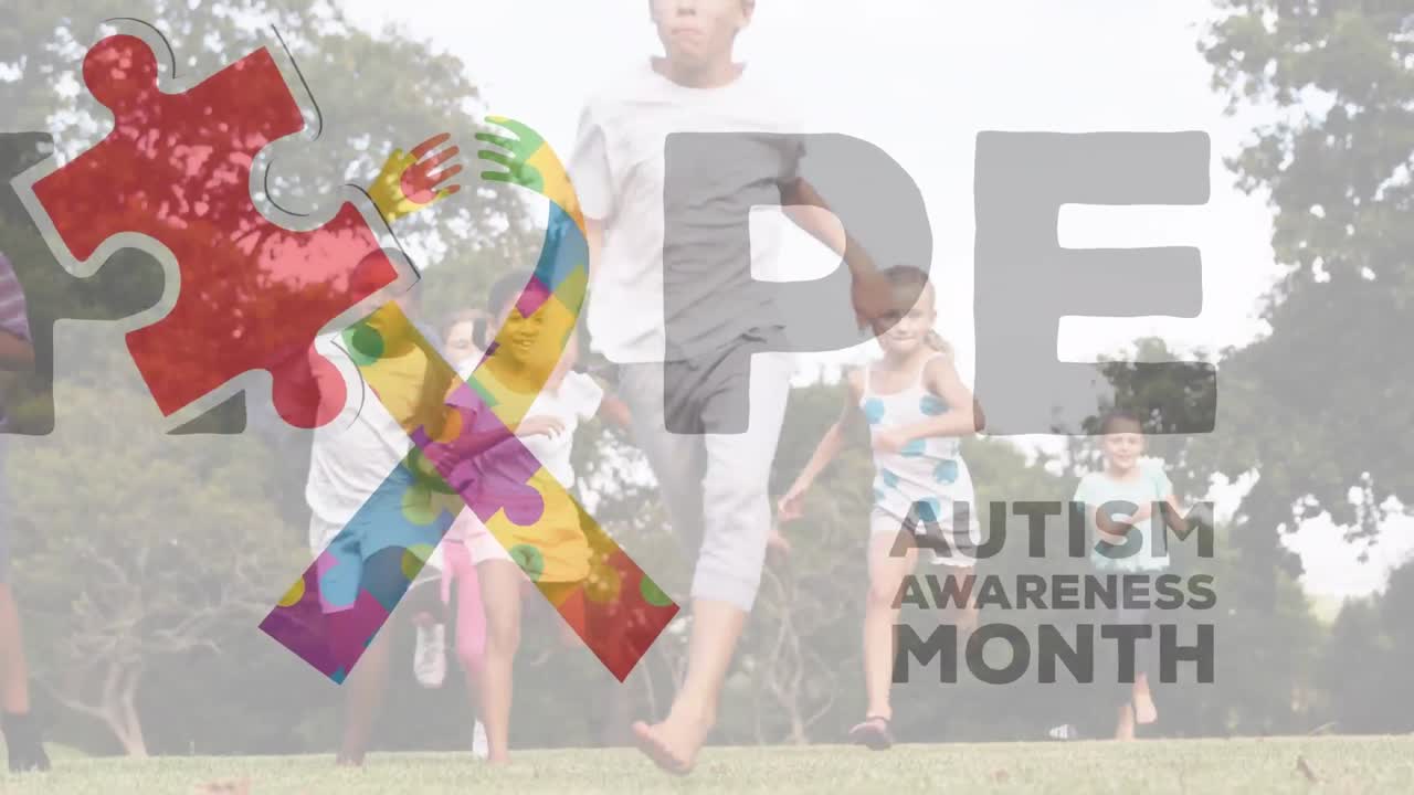 다채로운 퍼즐 조각의 애니메이션으로 학교 어린이들에게 자폐증 인식 리본을 만들고 있습니다.