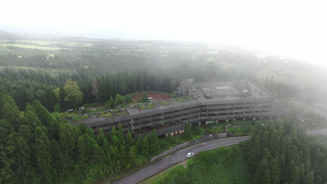 Abandoned hotel Monte palace at S&atilde;o Miguel during a cloudy day, aerial