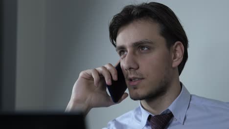 young man with phone call