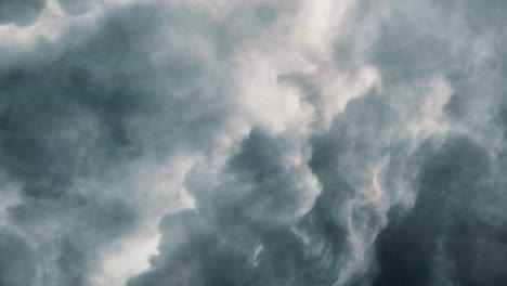 Flying-through-among-clouds-thunderstorm-in-sky