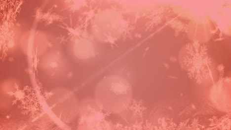 animation of snow falling over background with bokeh and red filter