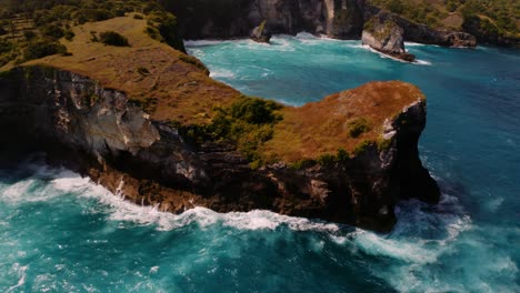 breathtaking geological formations along nusa penida  coastline; drone