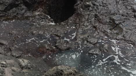 blow hole filling with water in tenerife island, static view